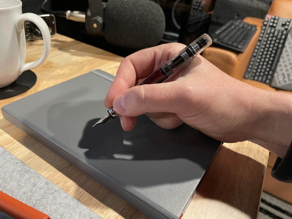 me holding my twsbi diamond 580